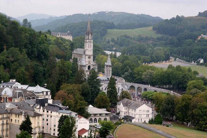 Lourdes, France.  in 1858 a peasant girl had visions of the Virgin Mary here, and the place subsequently became an important site of pilgrimage, in particular for those suffering from diseases that have no cure, for Lourdes is most famous for its number of miraculous healings (thousands of them).  